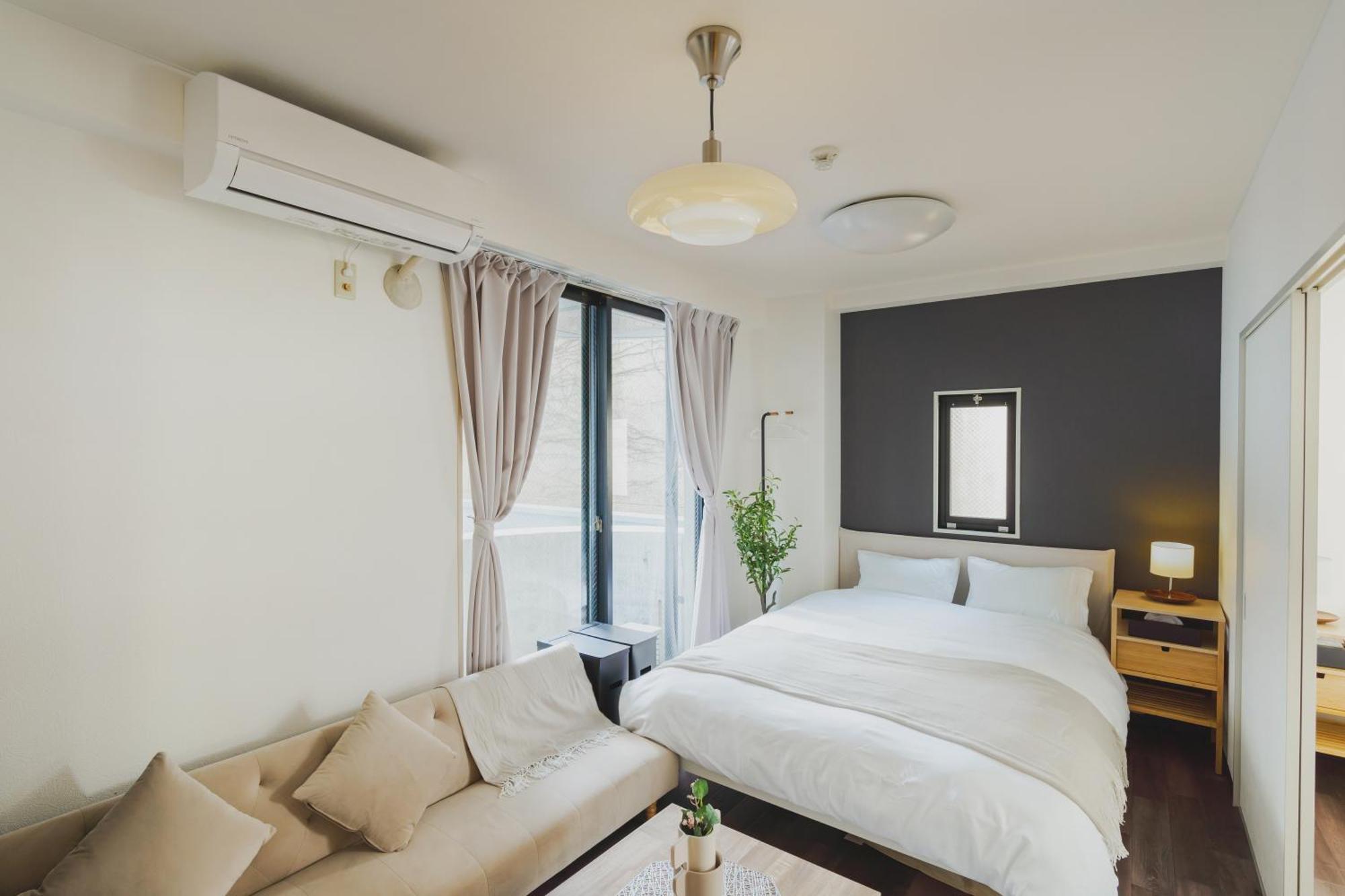 Blossom Coat Sakuragawa Aparthotel Осака Екстериор снимка